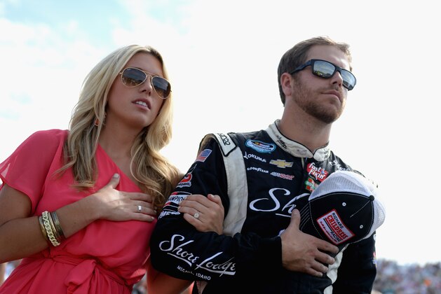 LOUDON, NH - JULY 13: Brian Scott, driver of the #2 Shore Lodge Chevrolet, stands with his fiance Whitney Kay on the grid before the NASCAR Nationwide Series CNBC Prime's The Profit 200 at New Hampshire Motor Speedway on July 13, 2013 in Loudon, New Hampshire.  (Photo by Patrick Smith/Getty Images)