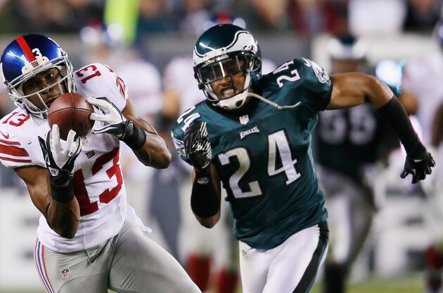 PHILADELPHIA, PA - SEPTEMBER 30:  Wide receiver Ramses Barden #13 of the New York Giants catches a pass in front of cornerback Nnamdi Asomugha #24 of the Philadelphia Eagles at Lincoln Financial Field on September 30, 2012 in Philadelphia, Pennsylvania.  (Photo by Rob Carr/Getty Images)