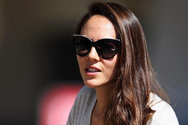 BAHRAIN, BAHRAIN - FEBRUARY 21:  Jessica Michibata, girlfriend of Jenson Button of Great Britain and McLaren sits in the paddock during day three of Formula One Winter Testing at the Bahrain International Circuit on February 21, 2014 in Bahrain, Bahrain.  (Photo by Mark Thompson/Getty Images)