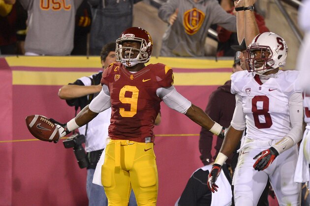 Southern California wide receiver Marqise Lee celebrates a successful two point conversion as Stanford safety Jordan Richards looks on during the first half of their NCAA college football game, Saturday, Nov. 16, 2013, in Los Angeles. (AP Photo/Mark J. Terrill)