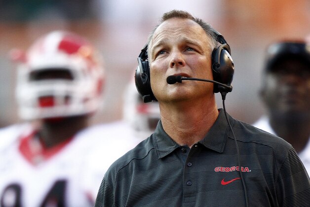 ADVANCE FOR WEEKEND EDITIONS, OCT. 26-27 - FILE - In this Oct. 5, 2013, file photo, Georgia head coach Mark Richt looks up from the sidelines in the third quarter of an NCAA college football game against Tennessee in Knoxville, Tenn. In a span of only three weeks, Georgia has dropped from No. 6 in The AP Top 25 to being unranked as it has an open week to prepare for its Nov. 2 game against Florida.  (AP Photo/Wade Payne, File)