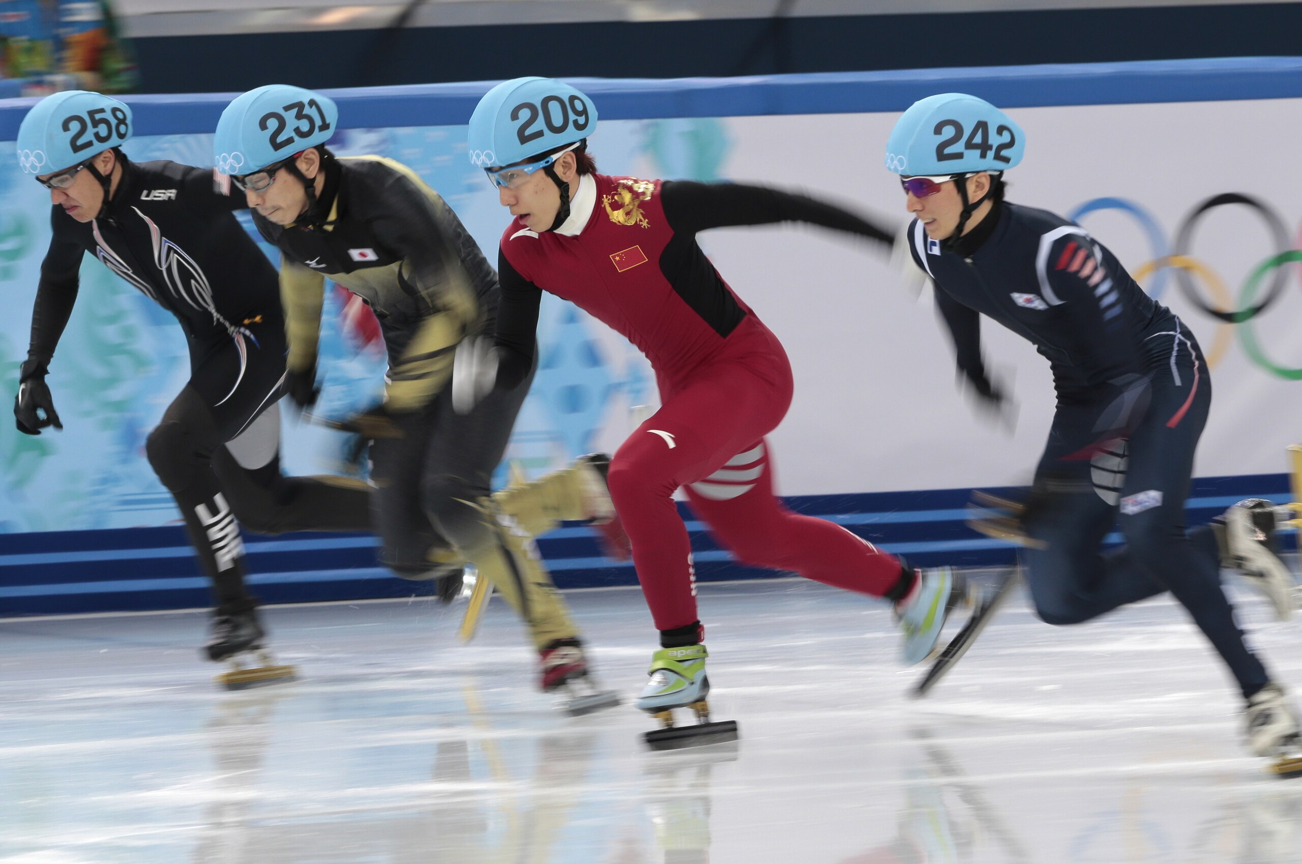 From left, J.R. Celski of the United States, Satoshi Sakashita of Japan, Han Tianyu of China, and Park Se-Yeong of South Korea start in a men's 500m short track speedskating quarterfinal at the Iceberg Skating Palace during the 2014 Winter Olympics, Friday, Feb. 21, 2014, in Sochi, Russia. (AP Photo/Ivan Sekretarev)