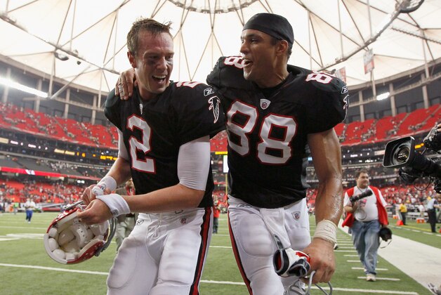ATLANTA - OCTOBER 03:  Quarterback Matt Ryan #2 and Tony Gonzalez #88 of the Atlanta Falcons celebrate after their 16-14 win over the San Francisco 49ers at Georgia Dome on October 3, 2010 in Georgia.  (Photo by Kevin C. Cox/Getty Images)