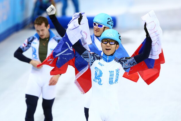SOCHI, RUSSIA - FEBRUARY 21:  Victor An of Russia celebrates winning the gold medal in the Short Track Men's 5000m Relay on day fourteen of the 2014 Sochi Winter Olympics at Iceberg Skating Palace on February 21, 2014 in Sochi, Russia.  (Photo by Paul Gilham/Getty Images)