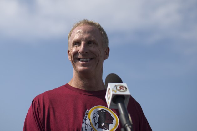 Washington Redskins' Defensive Coordinator Jim Haslett smiles during a news conference during NFL football minicamp at Redskins Park, Wednesday, June 12, 2013, in Ashburn, Va. (AP Photo/Carolyn Kaster)