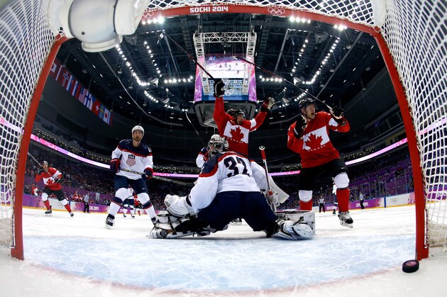 SOCHI, RUSSIA - FEBRUARY 21:  Jamie Benn #22 of Canada scores a second-period goal against Jonathan Quick #32 of the United States during the Men's Ice Hockey Semifinal Playoff on Day 14 of the 2014 Sochi Winter Olympics at Bolshoy Ice Dome on February 21, 2014 in Sochi, Russia.  (Photo by Julio Cortez-Pool/Getty Images)