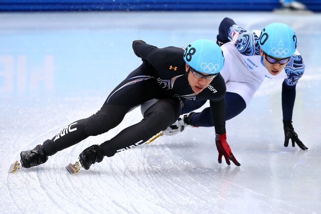 SOCHI, RUSSIA - FEBRUARY 21:  J.R. Celski of the United States leads to Victor An of Russia in the Short Track Men's 5000m Relay A on day fourteen of the 2014 Sochi Winter Olympics at Iceberg Skating Palace on February 21, 2014 in Sochi, Russia.  (Photo by Ryan Pierse/Getty Images)