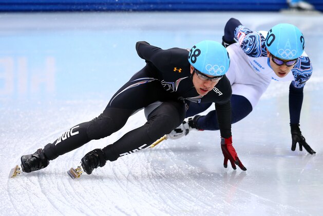 SOCHI, RUSSIA - FEBRUARY 21:  J.R. Celski of the United States leads to Victor An of Russia in the Short Track Men's 5000m Relay A on day fourteen of the 2014 Sochi Winter Olympics at Iceberg Skating Palace on February 21, 2014 in Sochi, Russia.  (Photo by Ryan Pierse/Getty Images)
