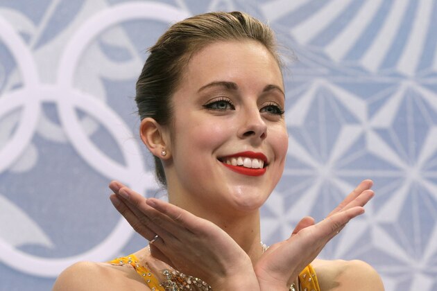 Ashley Wagner of the United States gestures as she waits in the results area after completing her routine in the women's free skate figure skating finals at the Iceberg Skating Palace during the 2014 Winter Olympics, Thursday, Feb. 20, 2014, in Sochi, Russia. (AP Photo/Bernat Armangue)