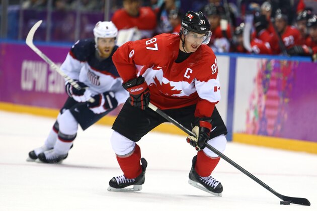 SOCHI, RUSSIA - FEBRUARY 21:  Sidney Crosby #87 of Canada controls the puck during the Men's Ice Hockey Semifinal Playoff against the United States on Day 14 of the 2014 Sochi Winter Olympics at Bolshoy Ice Dome on February 21, 2014 in Sochi, Russia.  (Photo by Al Bello/Getty Images)