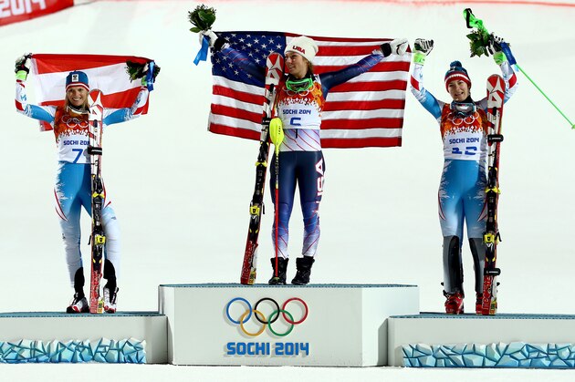 SOCHI, RUSSIA - FEBRUARY 21:  (L-R) Silver medalist Marlies Schild of Austria, gold medalist Mikaela Shiffrin of the United States and bronze medalist Kathrin Zettel of Austria celebrate during the flower ceremony for the Women's Slalom during day 14 of the Sochi 2014 Winter Olympics at Rosa Khutor Alpine Center on February 21, 2014 in Sochi, Russia.  (Photo by Doug Pensinger/Getty Images)