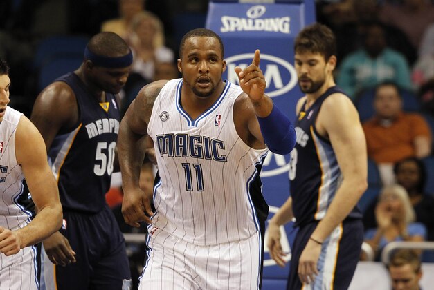 Feb 12, 2014; Orlando, FL, USA; Orlando Magic power forward Glen Davis (11) reacts and points after he made a basket against the Memphis Grizzlies during the first quarter at Amway Center. Mandatory Credit: Kim Klement-USA TODAY Sports