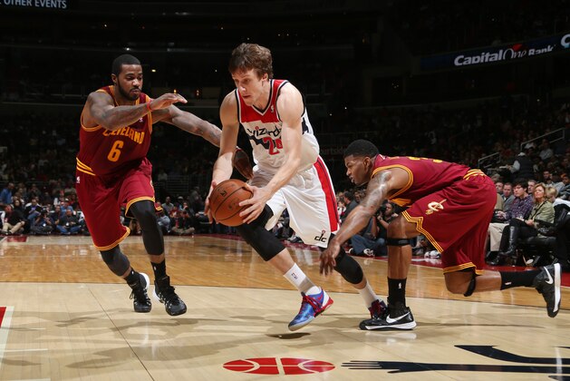 WASHINGTON, DC - NOVEMBER 16: Jan Vesely #24 of the Washington Wizards drives against Earl Clark #6 of the Cleveland Cavaliers during the game at the Verizon Center on November 16, 2013 in Washington, DC. NOTE TO USER: User expressly acknowledges and agrees that, by downloading and or using this photograph, User is consenting to the terms and conditions of the Getty Images License Agreement. Mandatory Copyright Notice: Copyright 2013 NBAE (Photo by Ned Dishman/NBAE via Getty Images)