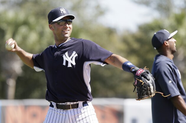New York Yankees shortstop Derek Jeter participates in a drill during spring training baseball practice Thursday, Feb. 20, 2014, in Tampa, Fla. (AP Photo/Charlie Neibergall)