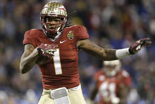 Florida State's Kelvin Benjamin (1) runs for a touchdown after a catch against Duke in the second half of the Atlantic Coast Conference Championship NCAA football game in Charlotte, N.C., Saturday, Dec. 7, 2013. (AP Photo/Bob Leverone)