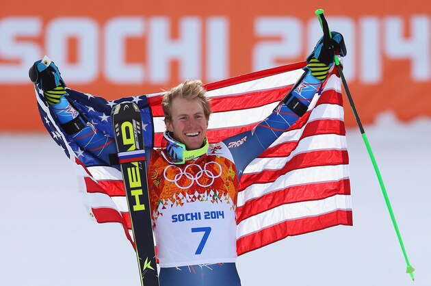 SOCHI, RUSSIA - FEBRUARY 19:  Gold medalist Ted Ligety of the United States celebrates during the flower ceremony for the the Alpine Skiing Men's Giant Slalom on day 12 of the Sochi 2014 Winter Olympics at Rosa Khutor Alpine Center on February 19, 2014 in Sochi, Russia.  (Photo by Doug Pensinger/Getty Images)
