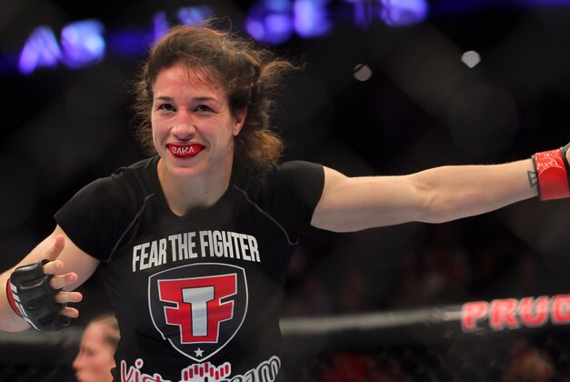 Apr 27, 2013; Newark, NJ, USA; Sara McMann (black shorts) celebrates defeating Sheila Gaff (not pictured) during UFC 159 at the Prudential Center. Mandatory Credit: Brad Penner-USA TODAY Sports Apr 27, 2013; Newark, NJ, USA; Sara McMann (black shorts) celebrates defeating Sheila Gaff (not pictured) during UFC 159 at the Prudential Center. Mandatory Credit: Brad Penner-USA TODAY Sports