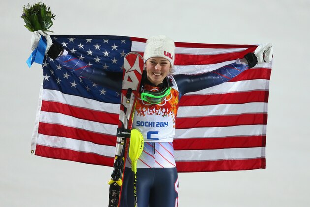 SOCHI, RUSSIA - FEBRUARY 21:  Gold medalist Mikaela Shiffrin of the United States celebrates during the flower ceremony for the Women's Slalom during day 14 of the Sochi 2014 Winter Olympics at Rosa Khutor Alpine Center on February 21, 2014 in Sochi, Russia.  (Photo by Alexander Hassenstein/Getty Images)