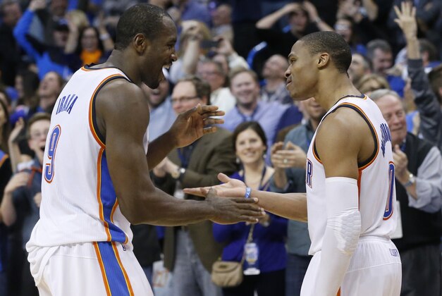 Oklahoma City Thunder Oklahoma City Thunder guard Russell Westbrook (0) celebrates with teammate Serge Ibaka during an NBA basketball game between the Golden State Warriors and the Oklahoma City Thunder in Oklahoma City, Friday, Nov. 29, 2013. Oklahoma City won 113-112. (AP Photo/Sue Ogrocki)