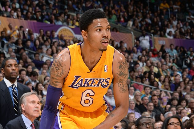 LOS ANGELES, CA - FEBRUARY 21: Kent Bazemore #6 of the Los Angeles Lakers handles the ball against the Boston Celtics at STAPLES Center on February 21, 2014 in Los Angeles, California. NOTE TO USER: User expressly acknowledges and agrees that, by downloading and/or using this Photograph, user is consenting to the terms and conditions of the Getty Images License Agreement. Mandatory Copyright Notice: Copyright 2014 NBAE (Photo by Andrew D. Bernstein/NBAE via Getty Images)