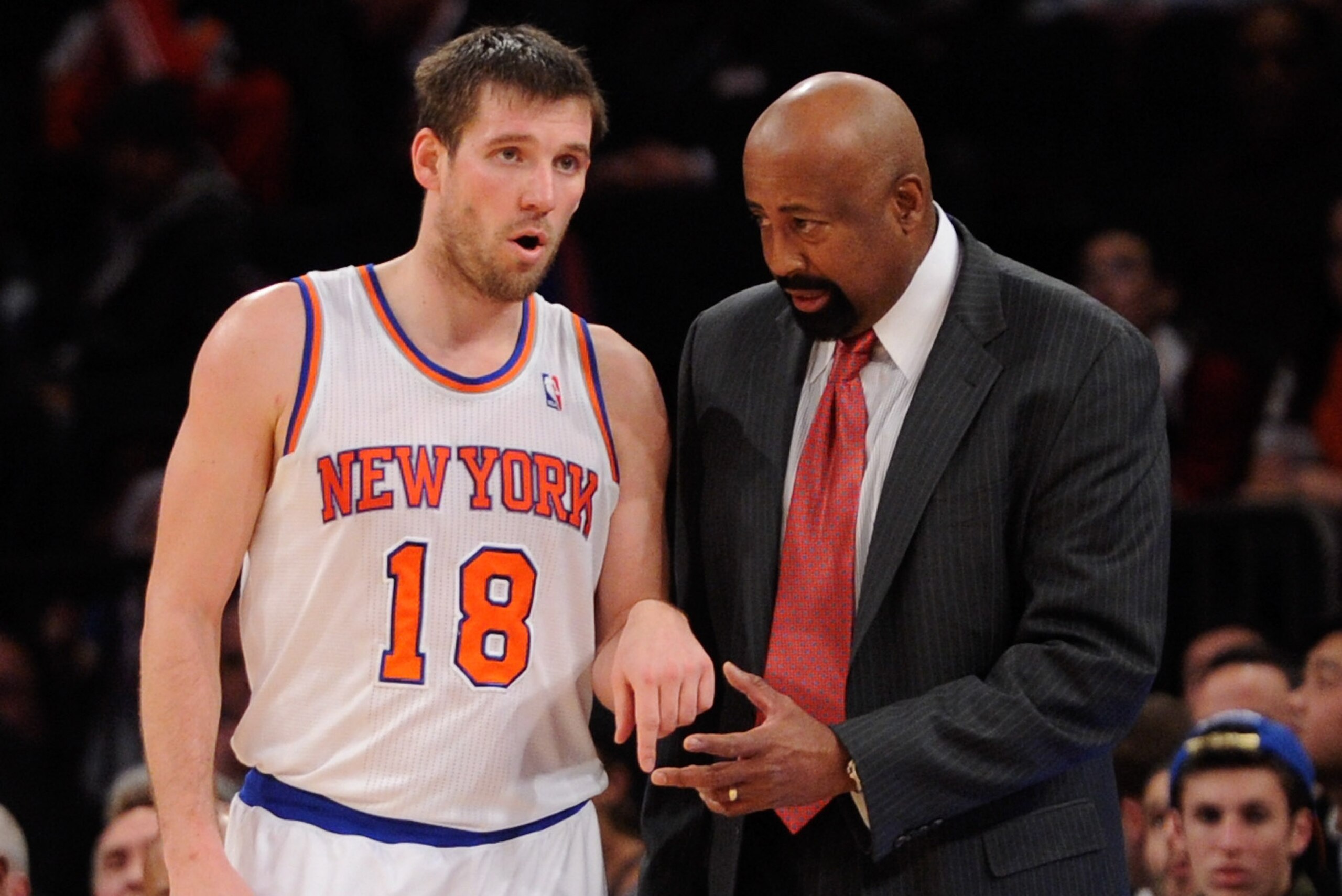 NEW YORK, NY - DECEMBER 16:  New York Knicks head coach Mike Woodson talks with Beno Udrih #18 of the New York Knicks during the second half against the Washington Wizards at Madison Square Garden on December 16, 2013 in New York City. NOTE TO USER: User expressly acknowledges and agrees that, by downloading and/or using this photograph, user is consenting to the terms and conditions of the Getty Images License Agreement. The Wizards defeat the Knicks 102-101.  (Photo by Maddie Meyer/Getty Images)