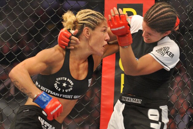 SAN JOSE, CA - AUGUST 15:  Cris Cyborg (L) battles Gina Carano during their Middleweight Championship fight at Stikeforce: Carano vs. Cyborg on August 15, 2009 in San Jose, California.  (Photo by Jon Kopaloff/Getty Images)