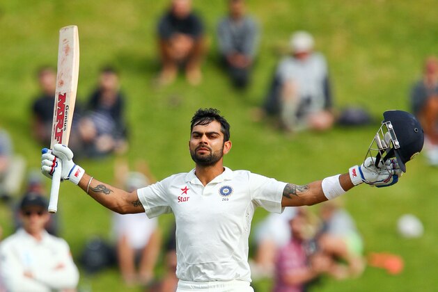 WELLINGTON, NEW ZEALAND - FEBRUARY 18:  Virat Kohli of India celebrates his century during day five of the 2nd Test match between New Zealand and India on February 18, 2014 in Wellington, New Zealand.  (Photo by Hagen Hopkins/Getty Images)
