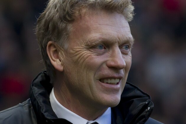 Manchester United's manager David Moyes takes to the touchline before his team's English Premier League soccer match against Fulham at Old Trafford Stadium, Manchester, England, Sunday Feb. 9, 2014. (AP Photo/Jon Super)