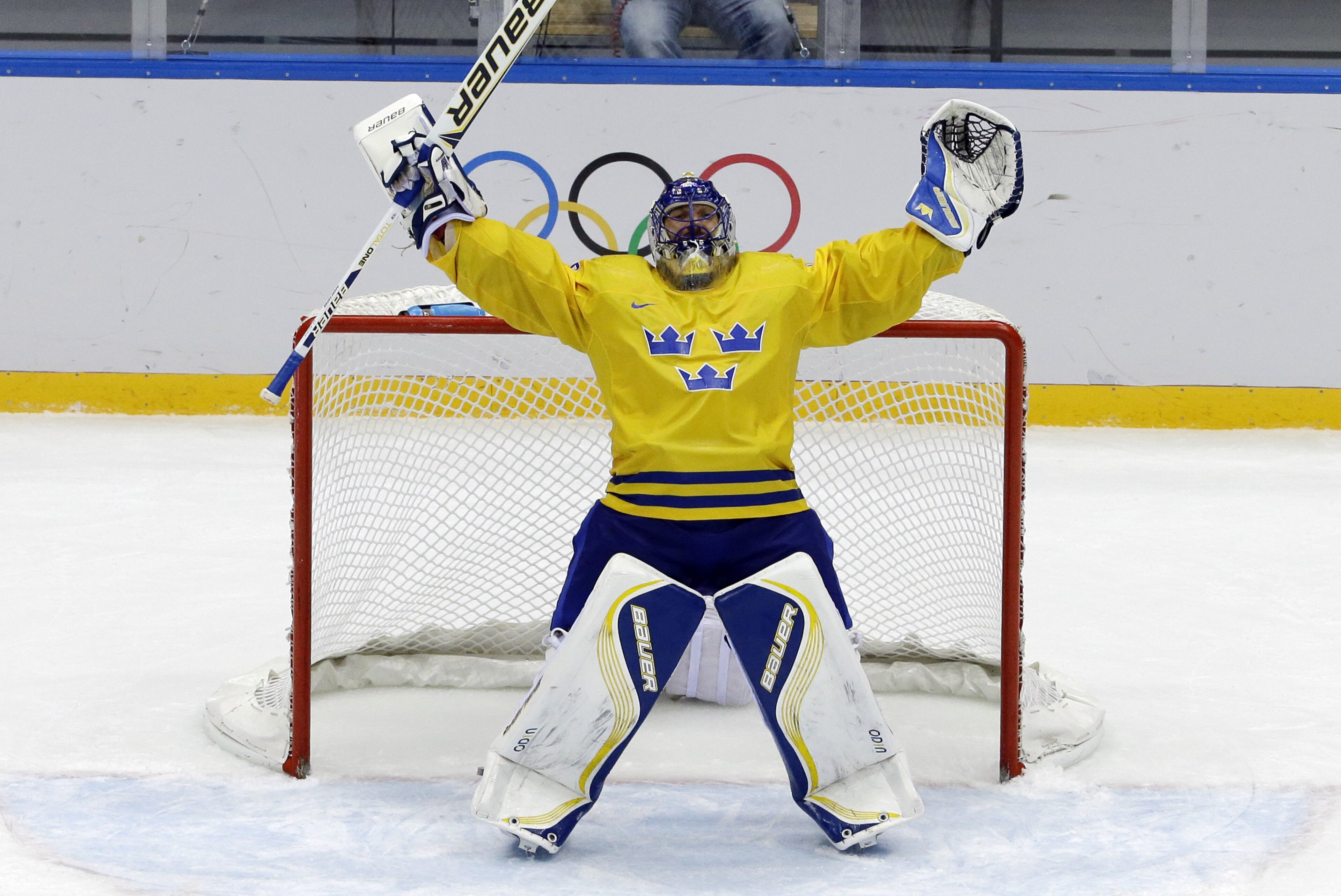 Sweden goaltender Henrik Lundqvist reacts after a men's semifinal ice hockey game against Finland at the 2014 Winter Olympics, Friday, Feb. 21, 2014, in Sochi, Russia. Sweden won 2-1 to advance to the gold medal game. (AP Photo/David J. Phillip_ )