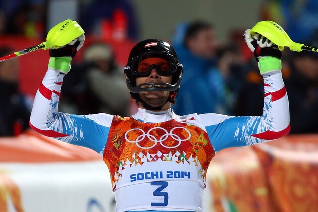 SOCHI, RUSSIA - FEBRUARY 22:  Mario Matt of Austria celebrates after finishing the second run during the Alpine Skiing Men's Slalom on day 15 of the Sochi Winter Olympics at Rosa Khutor Alpine Center on February 22, 2014 in Sochi, Russia.  (Photo by Robert Cianflone/Getty Images)