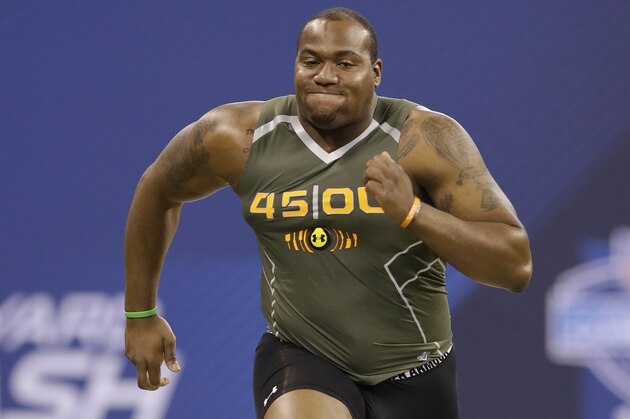Clemson offensive lineman Brandon Thomas runs the 40-yard dash at the NFL football scouting combine in Indianapolis, Saturday, Feb. 22, 2014. (AP Photo/Nam Y. Huh)