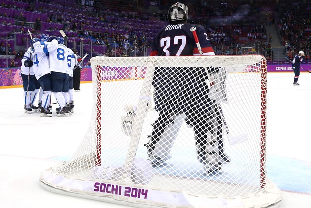 SOCHI, RUSSIA - FEBRUARY 22: Teemu Selanne #8 of Finland celebrates with teammates after a third period goal against Jonathan Quick #32 of the United States during the Men's Ice Hockey Bronze Medal Game on Day 15 of the 2014 Sochi Winter Olympics at Bolshoy Ice Dome on February 22, 2014 in Sochi, Russia.  (Photo by Streeter Lecka/Getty Images)