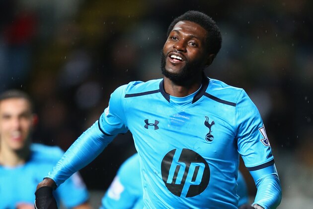NEWCASTLE UPON TYNE, ENGLAND - FEBRUARY 12:  Emmanuel Adebayor of Tottenham Hotspur celebrates scoring his sides third goal  during the Barclays Premier League match between Newcastle United and Tottenham Hotspur at St James' Park on February 12, 2014 in Newcastle upon Tyne, England.  (Photo by Michael Steele/Getty Images)