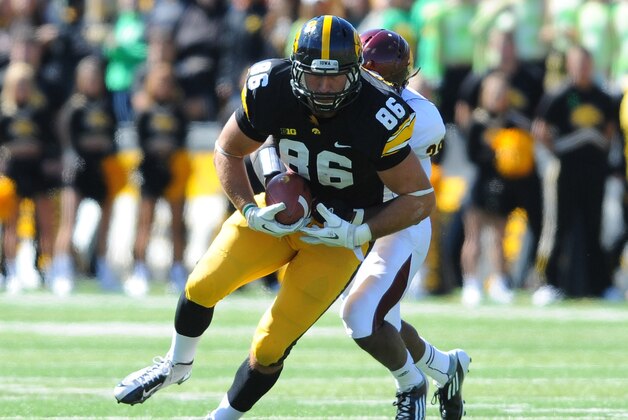 September 22, 2012; Iowa City, IA, USA; Iowa Hawkeyes tight end C.J. Fiedorowicz (86) runs for yardage in the first half of the game against the Central Michigan Chippewas  at Kinnick Stadium. Mandatory Credit: Denny Medley-USA TODAY Sports