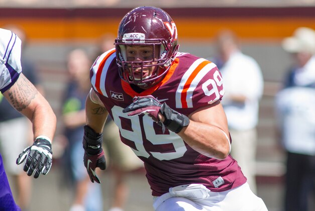 Sep 7, 2013; Blacksburg, VA, USA; Virginia Tech Hokies defensive end James Gayle (99) pursues the ball during the first quarter against the Western Carolina Catamounts at Lane Stadium. Virginia Tech defeated Western Carolina 45-3. Mandatory Credit: Jeremy Brevard-USA TODAY Sports