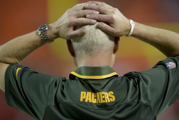 Green Bay Packers General Manager Ted Thompson looks on during the second half of their NFL football game in Kansas City, Mo., Thursday, Aug. 29, 2013. (AP Photo/Reed Hoffmann)