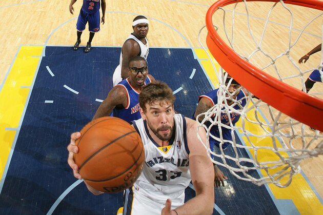 MEMPHIS, TN - FEBRUARY 18: Marc Gasol #33 of the Memphis Grizzlies shoots against the New York Knicks on February 18, 2014 at FedExForum in Memphis, Tennessee. NOTE TO USER: User expressly acknowledges and agrees that, by downloading and or using this photograph, User is consenting to the terms and conditions of the Getty Images License Agreement. Mandatory Copyright Notice: Copyright 2014 NBAE (Photo by Joe Murphy/NBAE via Getty Images)