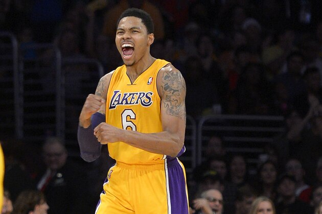 Los Angeles Lakers guard Kent Bazemore celebrates during the second half of an NBA basketball game against the Boston Celtics, Friday, Feb. 21, 2014, in Los Angeles. (AP Photo/Mark J. Terrill)