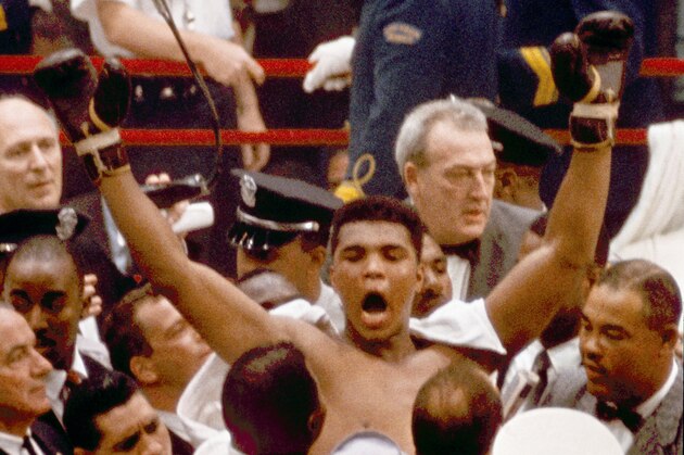 Muhammad Ali, or Cassius Clay at the time, strikes a familiar pose as he shouts