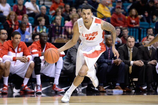 LAS VEGAS, NV - DECEMBER 21:  Kendall Williams #10 of the New Mexico Lobos drives against the Marquette Golden Eagles during their game at the MGM Grand Garden Arena on December 21, 2013 in Las Vegas, Nevada. New Mexico won 75-68.  (Photo by Jeff Bottari/Getty Images)