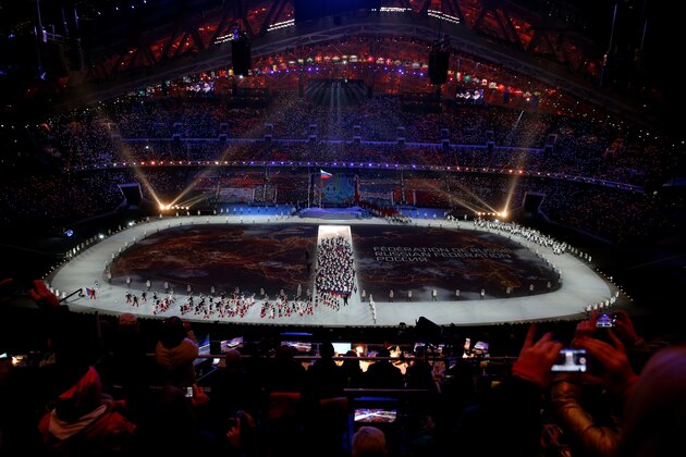 SOCHI, RUSSIA - FEBRUARY 07:  The Russia Olympic team enters the stadium during the Opening Ceremony of the Sochi 2014 Winter Olympics at Fisht Olympic Stadium on February 7, 2014 in Sochi, Russia.  (Photo by Quinn Rooney/Getty Images)