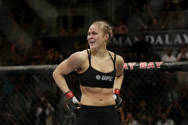 Ronda Rousey reacts after defeating Sara McMann following a UFC 170 mixed martial arts women's bantamweight title bout on Saturday, Feb. 22, 2014, in Las Vegas. (AP Photo/Isaac Brekken)