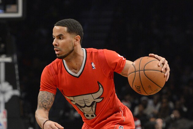 NEW YORK, NY - DECEMBER 25:  D.J. Augustin #14 of the Chicago Bulls controls the ball during the second quarter against the Brooklyn Nets at the Barclays Center on December 25, 2013 in the Brooklyn borough of New York City. NOTE TO USER: User expressly acknowledges and agrees that, by downloading and/or using this photograph, user is consenting to the terms and conditions of the Getty Images License Agreement. (Photo by Christopher Pasatieri/Getty Images)