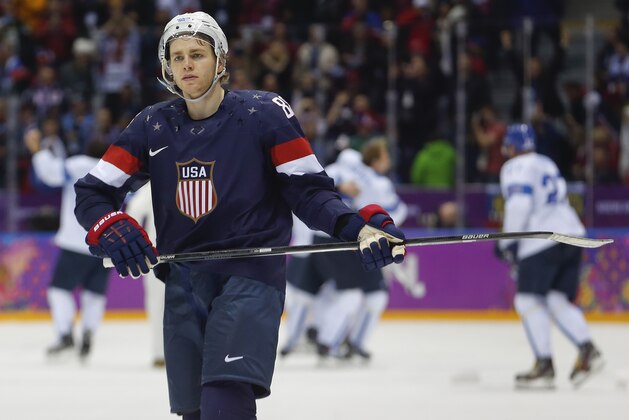 USA forward Patrick Kane skates off the ice after the USA lost 5-0 to Finland in the men's bronze medal ice hockey game at the 2014 Winter Olympics, Saturday, Feb. 22, 2014, in Sochi, Russia. (AP Photo/Petr David Josek) USA forward Patrick Kane skates off the ice after the USA lost 5-0 to Finland in the men's bronze medal ice hockey game at the 2014 Winter Olympics, Saturday, Feb. 22, 2014, in Sochi, Russia. (AP Photo/Petr David Josek)
