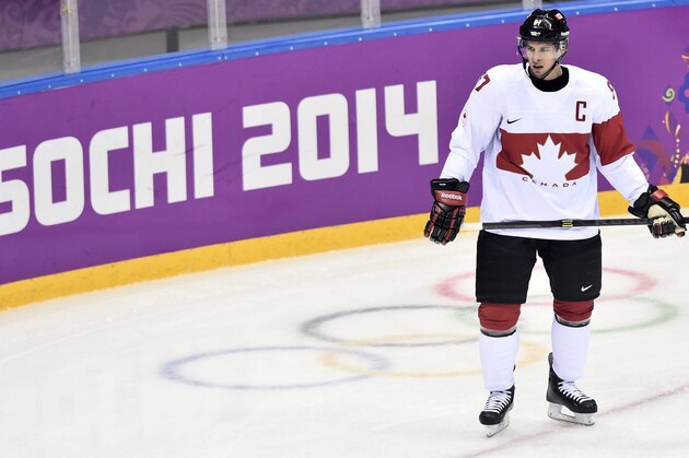 Canada's Sidney Crosby takes part in a warm-up ahead of quarterfinal hockey action against Latvia at the 2014 Sochi Winter Olympics in Sochi, Russia on Wednesday, Feb. 19, 2014. (AP Photo/The Canadian Press, Nathan Denette)