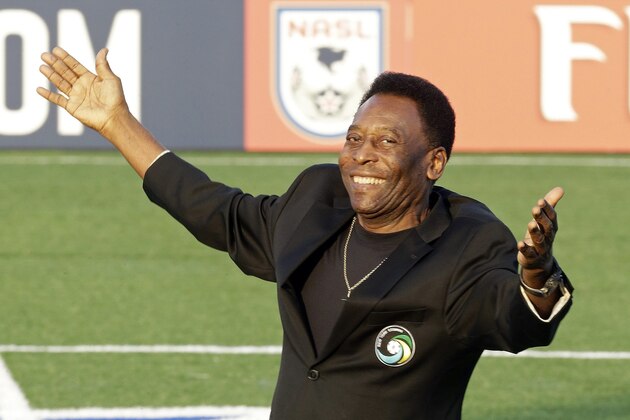 Brazilian soccer legend Pele waves to the crowd during a pregrame cereomy before a soccer game between the New York Cosmos and the Fort Lauderdale Strikers Saturday, Aug. 3, 2013, in Hempstead, N.Y. (AP Photo/Frank Franklin II)