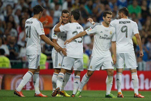 MADRID, SPAIN - AUGUST 22: Jese Rodriguez (2nd L) of Real Madrid CF celebrates scoring the team's fifth goal with teammates Alvaro B. Morata (L), Francisco Roman Alarcon (3d L), or Isco; Nacho Fernandez (2nd R) and Karim Benzema (R) during the Santiago Bernabeu Trophy match between Real Madrid CF and Al-Sadd at Estadio Santiago Bernabeu on August 22, 2013 in Madrid, Spain. (Photo by Gonzalo Arroyo Moreno/Getty Images) MADRID, SPAIN - AUGUST 22: Jese Rodriguez (2nd L) of Real Madrid CF celebrates scoring the team's fifth goal with teammates Alvaro B. Morata (L), Francisco Roman Alarcon (3d L), or Isco; Nacho Fernandez (2nd R) and Karim Benzema (R) during the Santiago Bernabeu Trophy match between Real Madrid CF and Al-Sadd at Estadio Santiago Bernabeu on August 22, 2013 in Madrid, Spain. (Photo by Gonzalo Arroyo Moreno/Getty Images)