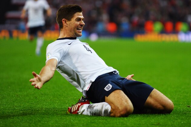 LONDON, ENGLAND - OCTOBER 15:  Steven Gerrard of England celebrates as he scores their second goal during the FIFA 2014 World Cup Qualifying Group H match between England and Poland at Wembley Stadium on October 15, 2013 in London, England.  (Photo by Laurence Griffiths/Getty Images)