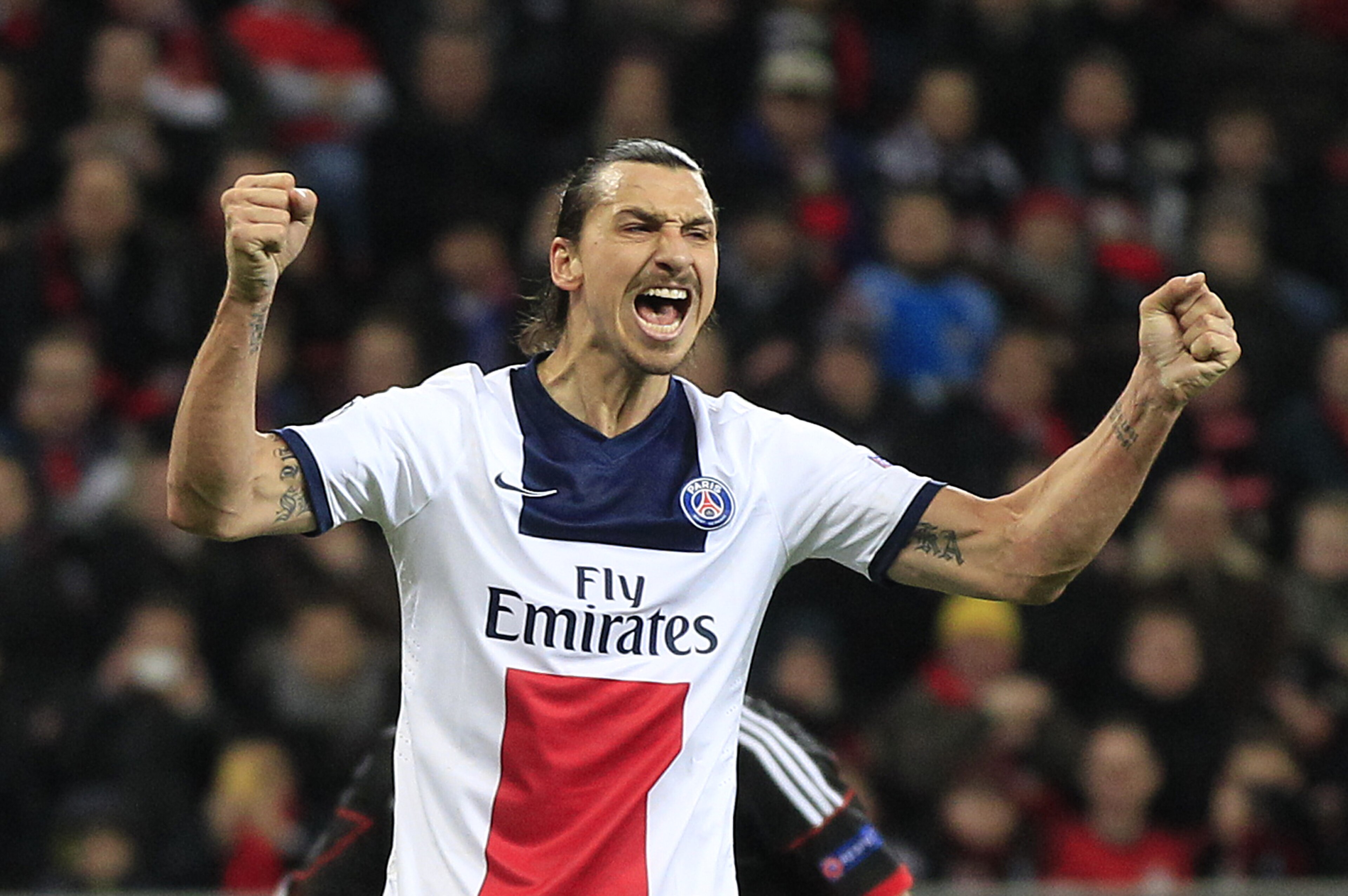 PSG's Zlatan Ibrahimovic celebrates after ecoring during a Champions League round of the last 16 first leg soccer match between Bayer Leverkusen and Paris Saint-Germain in Leverkusen, Germany, Tuesday Feb. 18, 2014. (AP Photo/Frank Augstein) PSG's Zlatan Ibrahimovic celebrates after ecoring during a Champions League round of the last 16 first leg soccer match between Bayer Leverkusen and Paris Saint-Germain in Leverkusen, Germany, Tuesday Feb. 18, 2014. (AP Photo/Frank Augstein)