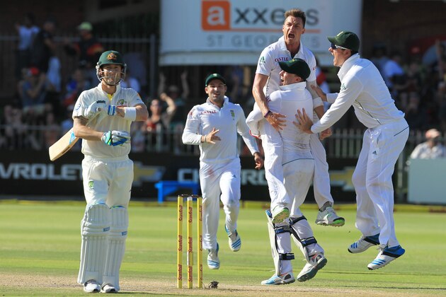 South Africa's bowler Dale Steyn, top right, celebrates with teammates after dismissing Australia's captain Michael Clarke, left, for 1 run on the fourth day of their second cricket test match at St George's Park in Port Elizabeth, South Africa, Sunday, Feb. 23, 2014. (AP Photo/ Themba Hadebe) South Africa's bowler Dale Steyn, top right, celebrates with teammates after dismissing Australia's captain Michael Clarke, left, for 1 run on the fourth day of their second cricket test match at St George's Park in Port Elizabeth, South Africa, Sunday, Feb. 23, 2014. (AP Photo/ Themba Hadebe)